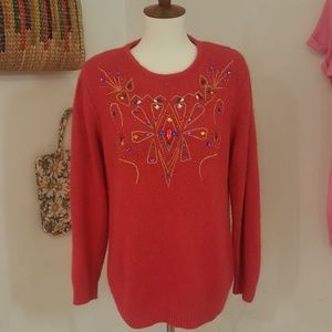 Jeweled magenta sweater.